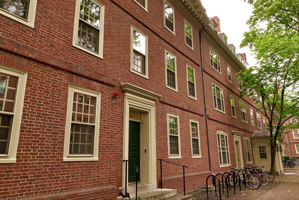 Photo of a red brick Harvard dormitory. 